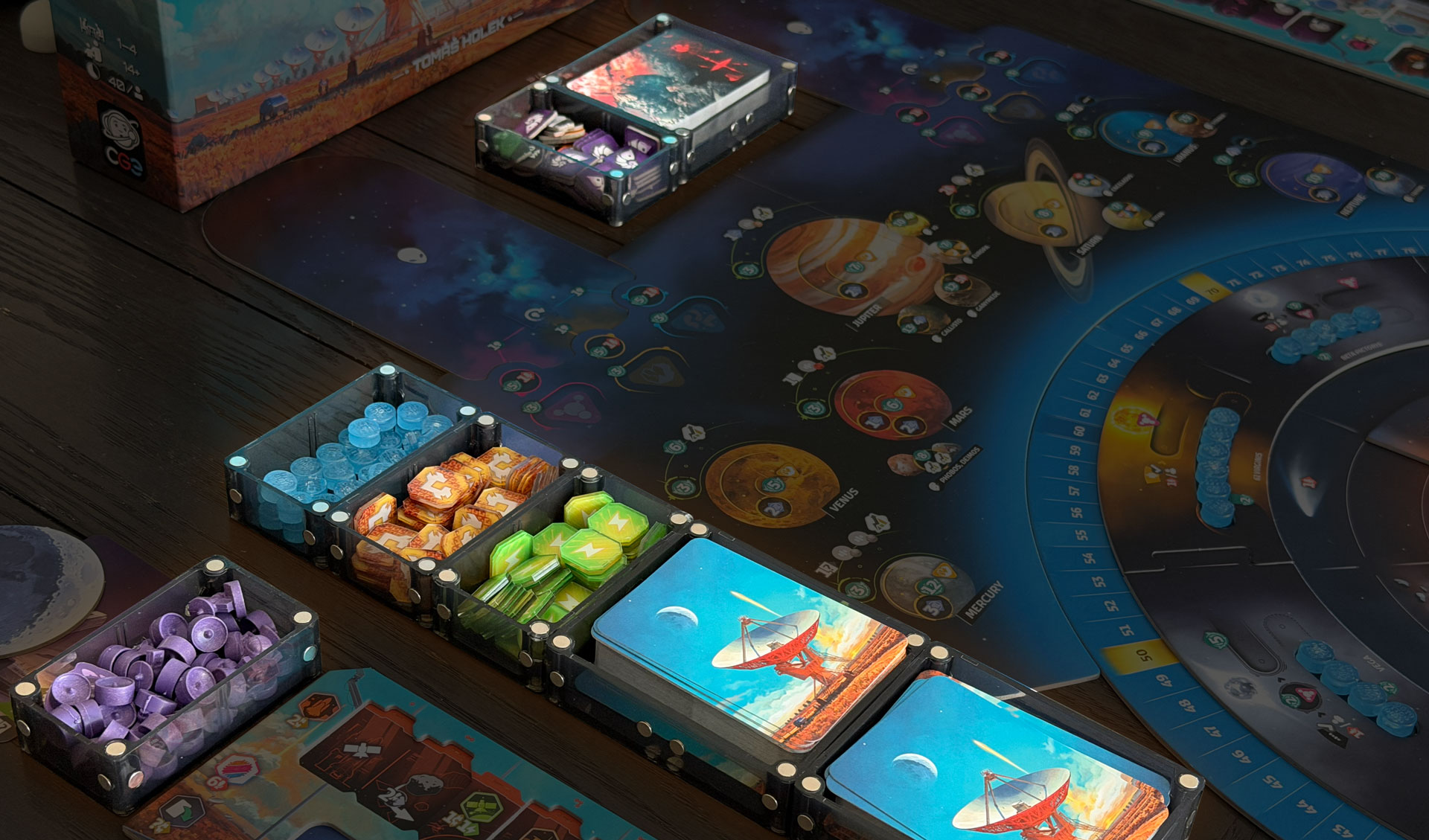 Piece Keepers organized with board game components on table